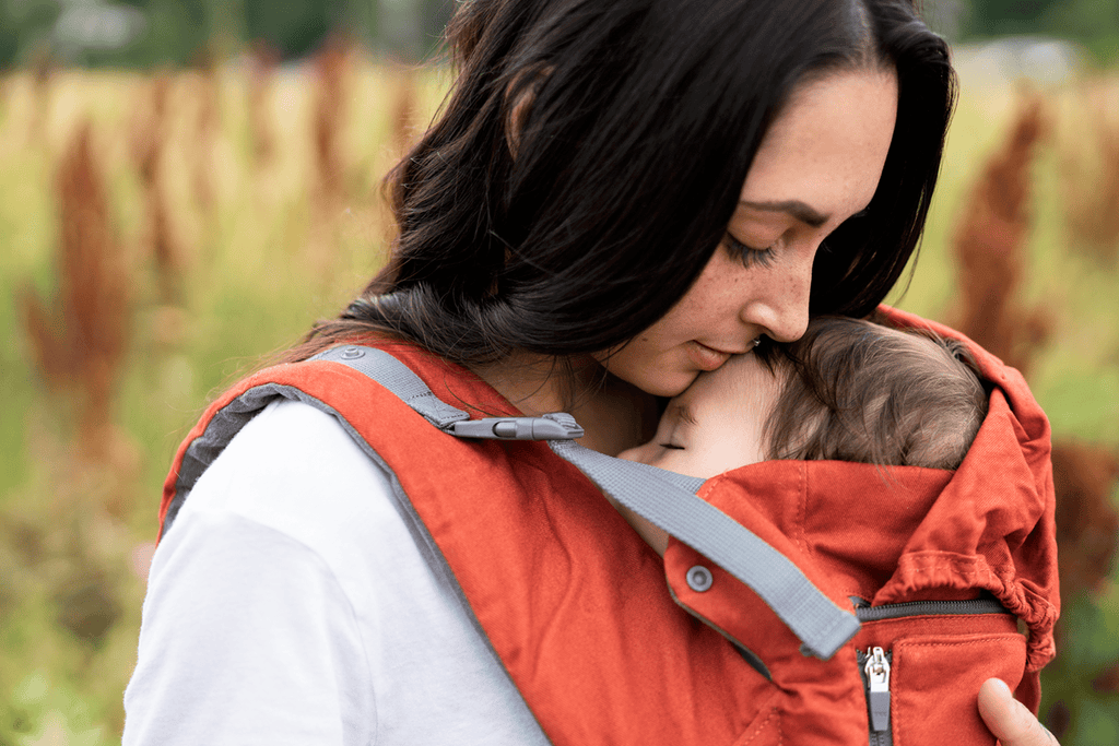 Babywearing provides a wonderful way for parents and their babies to stay close and connected to one another.