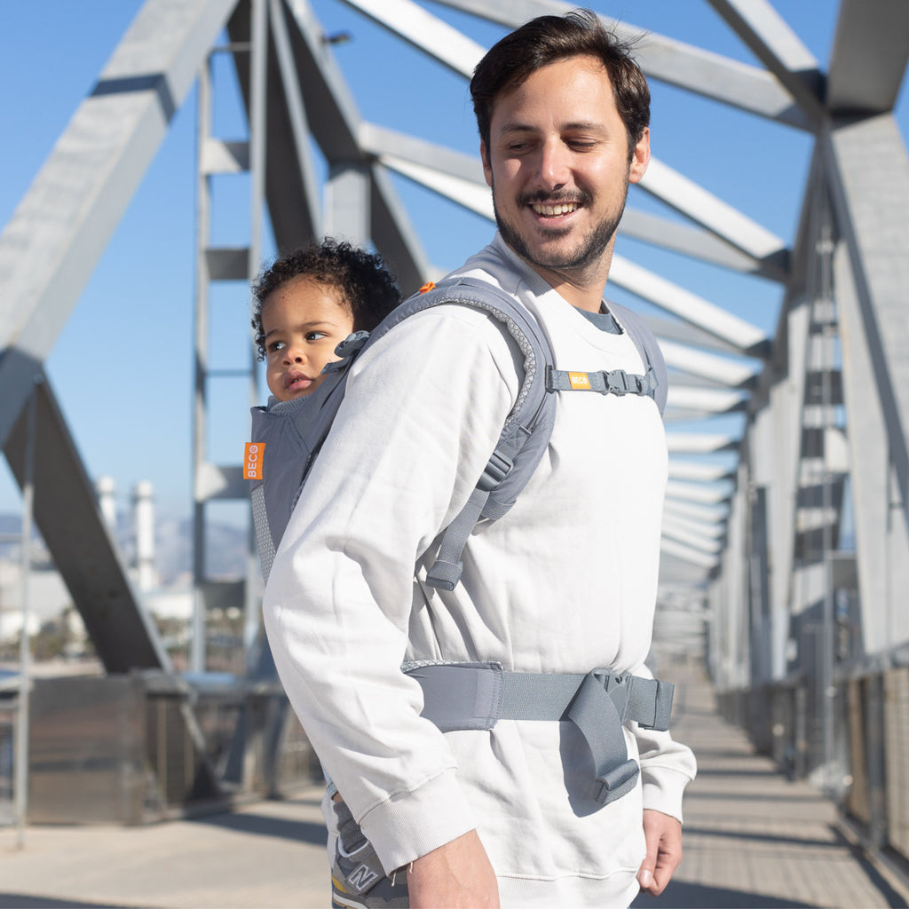 Toddler in back carrier - Beco Baby carrier in grey mesh