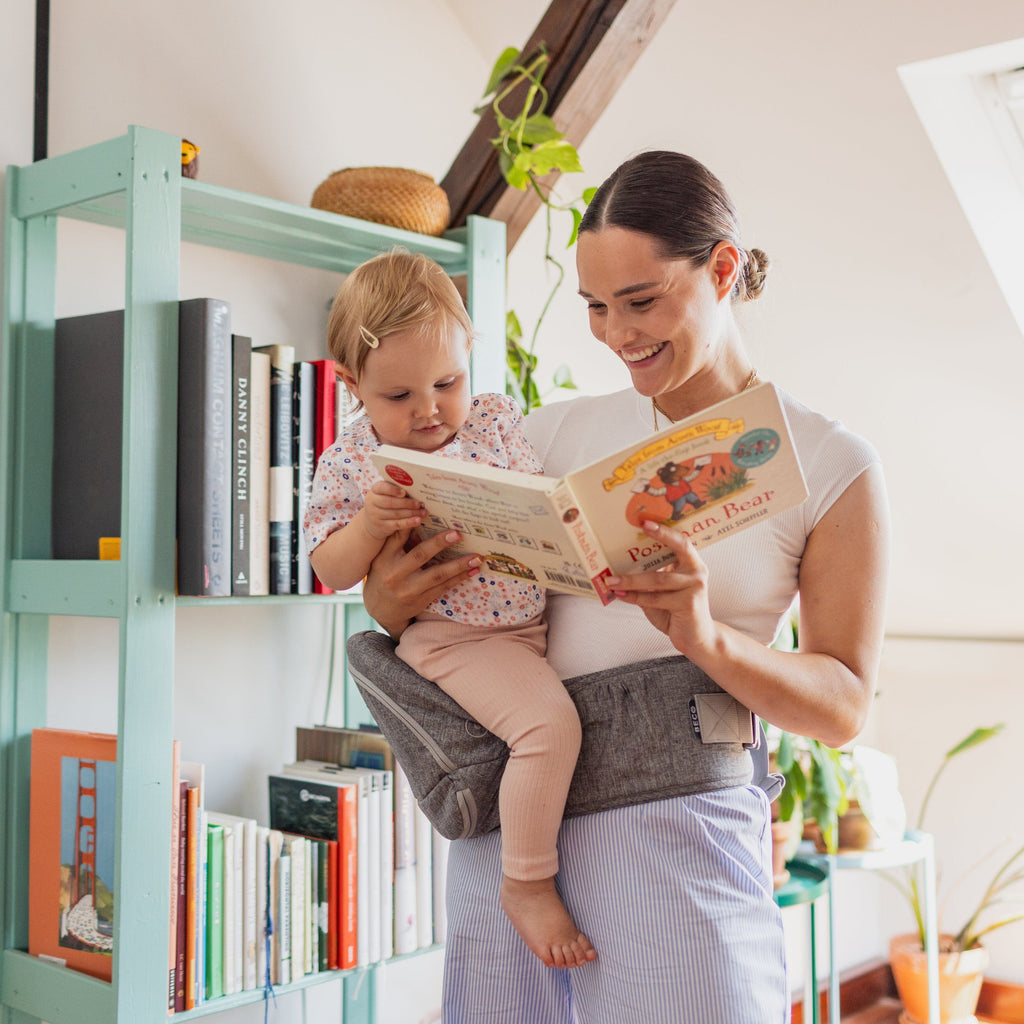 Beco Gemini Hip Seat Baby Carrier in Gray, ergonomic design for newborns to toddlers, featuring 4 carry positions and even weight distribution for all-day comfort.