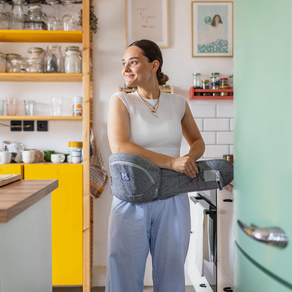 Beco Gemini Hip Seat Baby Carrier in Gray, ergonomic design for newborns to toddlers, featuring 4 carry positions and even weight distribution for all-day comfort.