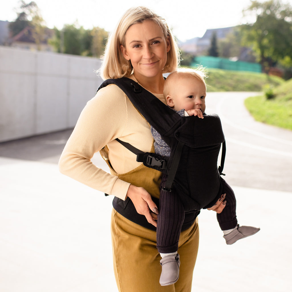Baby front carry facing out n the Beco Gemini baby carrier in metro black