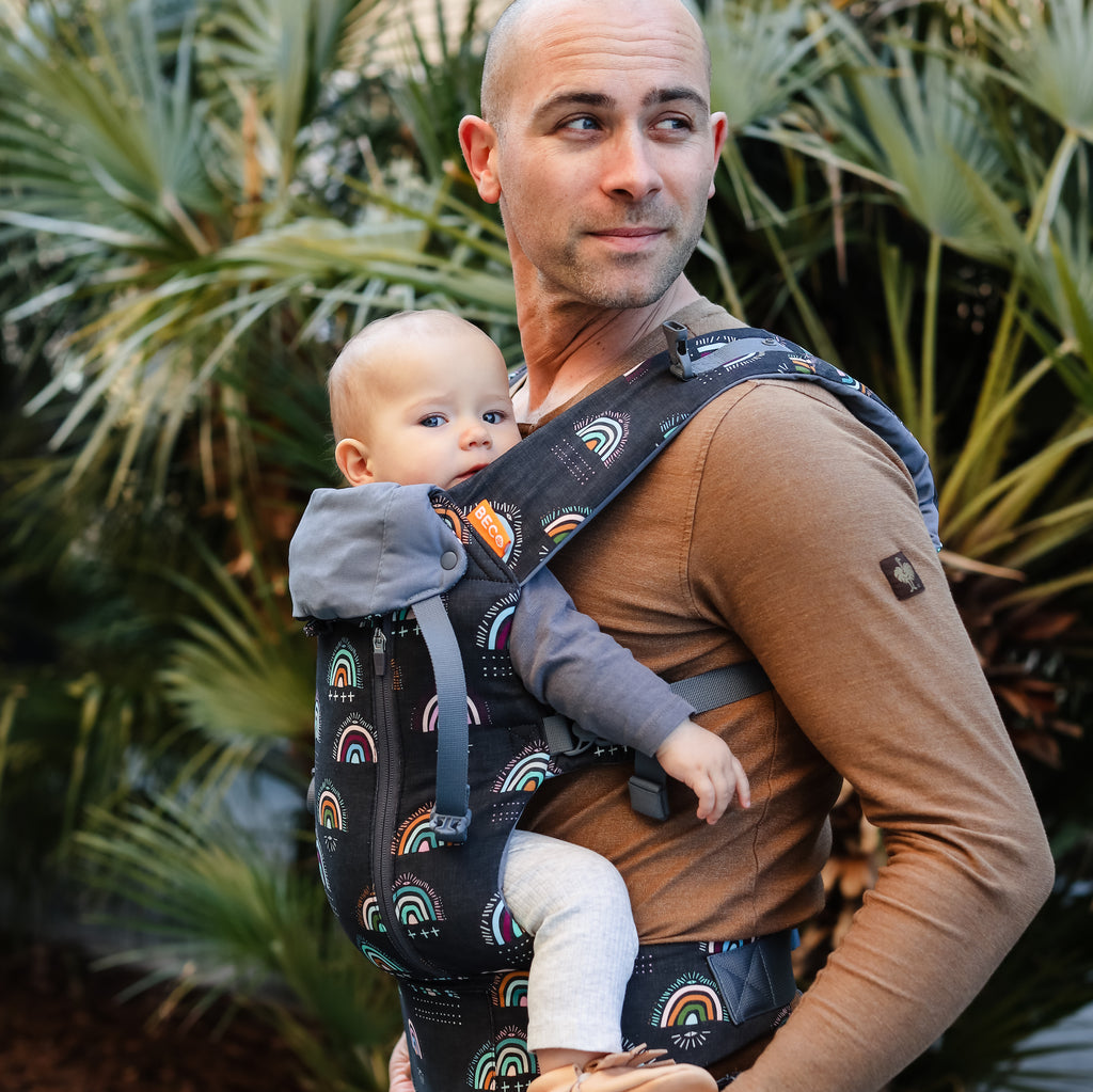 Beco 8 Baby Carrier in Boho Rainbow with baby front carry position.